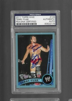 2011 TOPPS WWE WWF TERRY FUNK PSA DNA DUAL AUTO TEXAS BRONCO INSCRIPTION - Image 1 of 2
