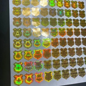 20 Pcs SHIELD LOGO NON RESIDUE HOLOGRAM SECURITY WARRANTY LABELS STICKERS  GOLD - Picture 1 of 4