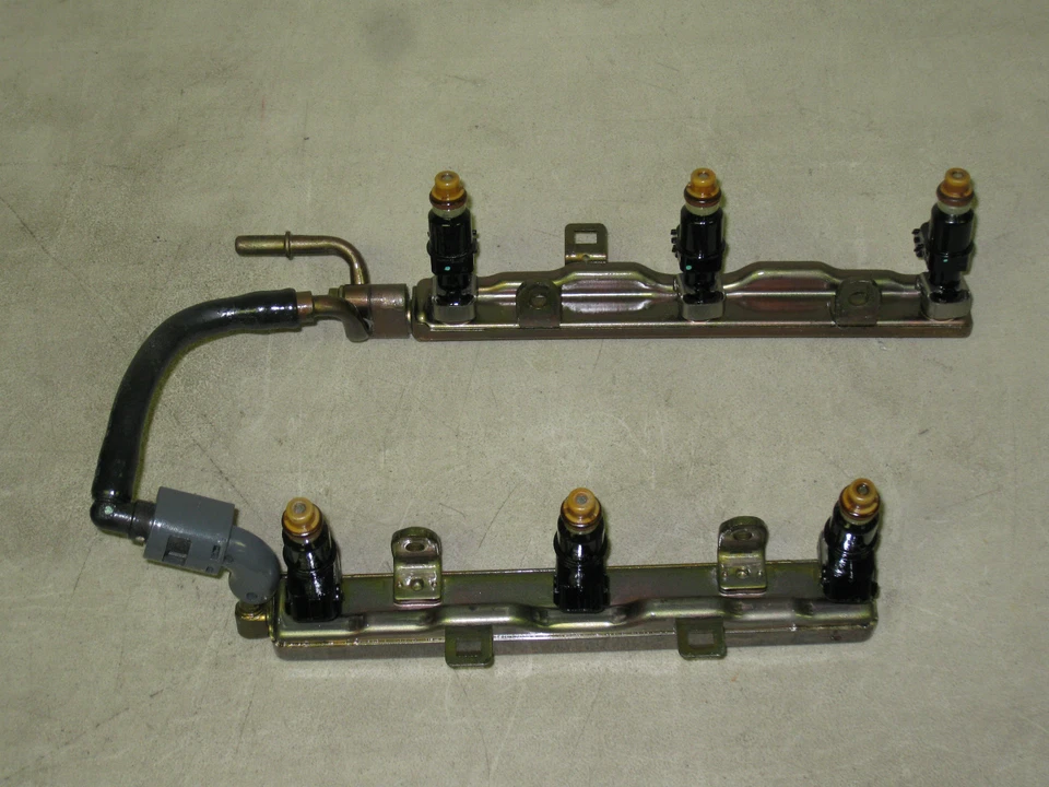 Juego de seis inyectores de combustible y rieles 04 05 06 07 Saturn Vue 3,5 L V6 6 cilindros OEM Foto 1 de 1