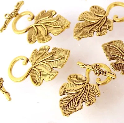 4 hojas de peltre antiguas doradas grandes hojas de arce palanca 35x22 mm Foto 1 de 2