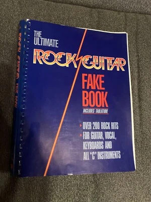 Libro falso de guitarra rock definitiva incluye tablatura Hal Leonard encuadernada en espiral Foto 1 de 4
