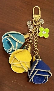 TÜRKIS BLAU GELB KUNSTLEDER ROSE QUASTE KRISTALL GRÜN KLEEBLATT TASCHENANHÄNGER 5" - Bild 1 von 4