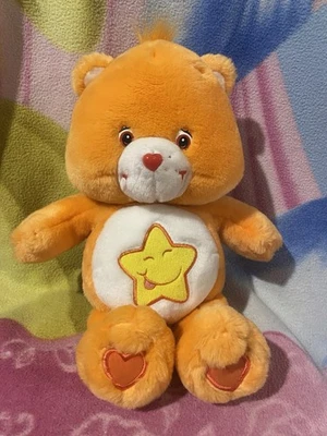 13" PLUSH ORANGE LAUGH A LOT YELLOW STAR SMILE TALKING SINGING CARE BEAR TOY - image 1 of 4