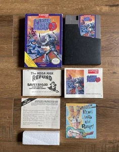 Mega Man 3 completo di scatola CIB con inserti! Ottime condizioni (Nintendo, NES 1990)๐ฅ - Foto 1 di 18