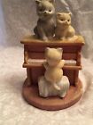 figurine Kittens playing piano. Ceramic. Ears are white.  Small crack in base. 