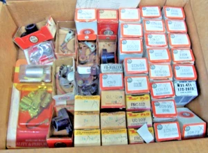 OLD AUTOMOTIVE IGNITION PARTS!! CONDENSORS! POINTS! ROTORS! ONE MONEY!! - Picture 1 of 1