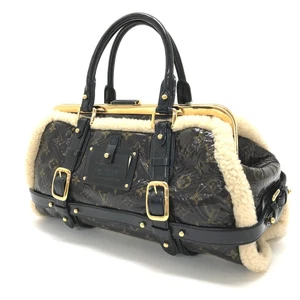 LOUIS VUITTON Monogram - Shearing storm Duffle Bag Brown M95574 - Picture 1 of 9