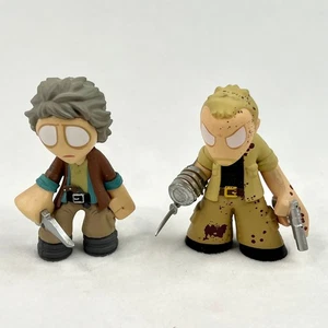 Zwei Funko Walking Dead Mystery Minis Carol Merle - Bild 1 von 6