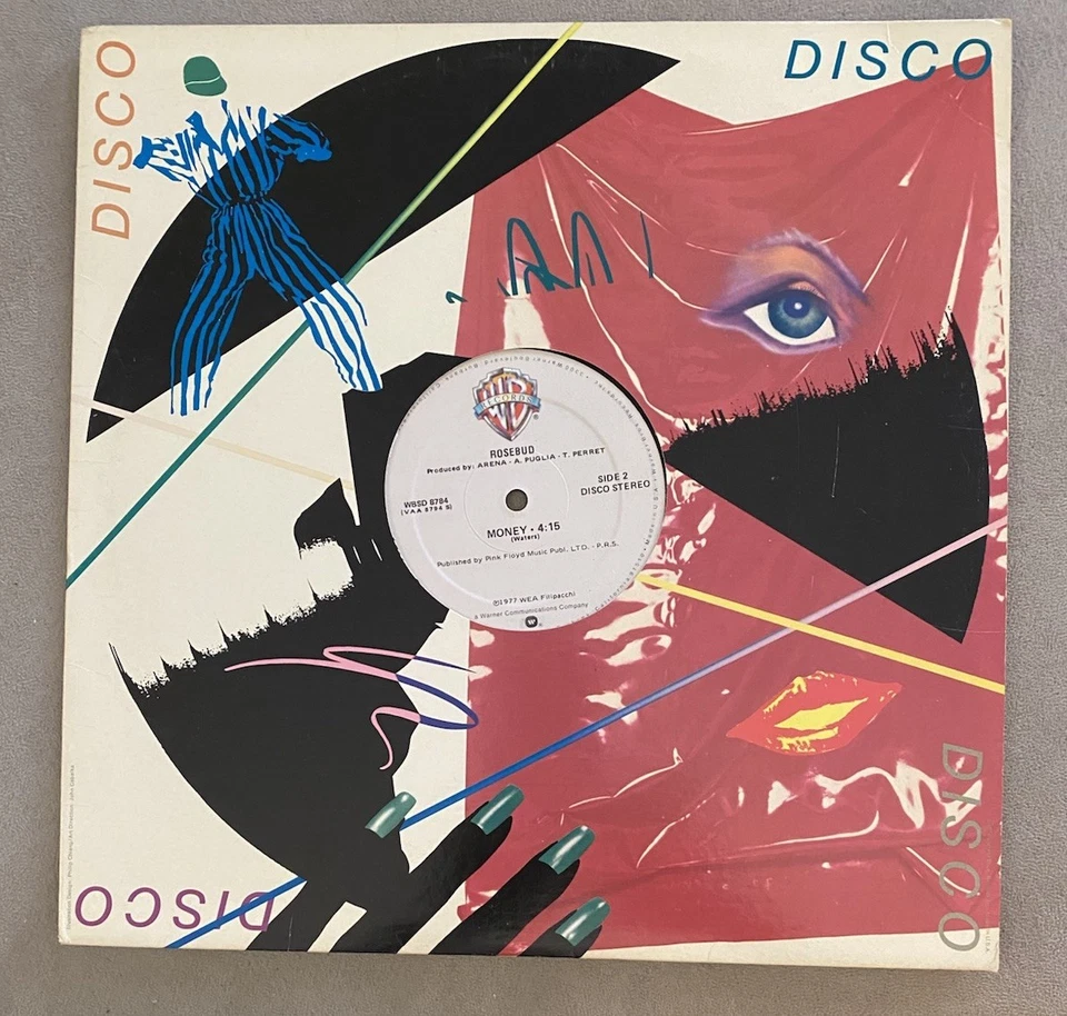 Rosebud – Money 12″ Disco Single (1977 Warner Bros WBSD 8784) Pink Floyd Cover  - Image 1 of 4
