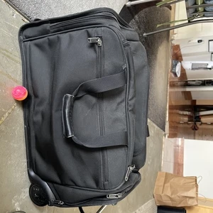 Black Nylon Tumi Rolling Cary On Duffle Bag Luggage w/ Retractable Handle - Picture 1 of 13