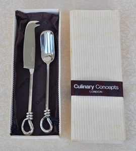 CONCEPTOS CULINARIOS SET DE 2 SERVIDORES DE QUESO DE TAMAÑO COMPLETO NUDO TRENZADO Y BOLSA DE ALMACENAMIENTO! - Imagen 1 de 4