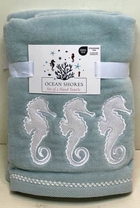 Ocean Shores ~Set of 2~Sea Foam Blue Hand Towels ~3 White Shimmering Sea Horses - Picture 1 of 3