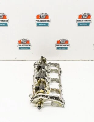 Оригинальный впускной кулачковый вал со стороны водителя для Nissan 370Z 2009-2022 годов выпуска с поясом Z34 - Изображение 1 из 4