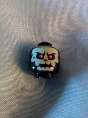LEGO - Minifig, Head Yellowish Green Skull with Red Eyes Pattern - Black - Image 1 of 4