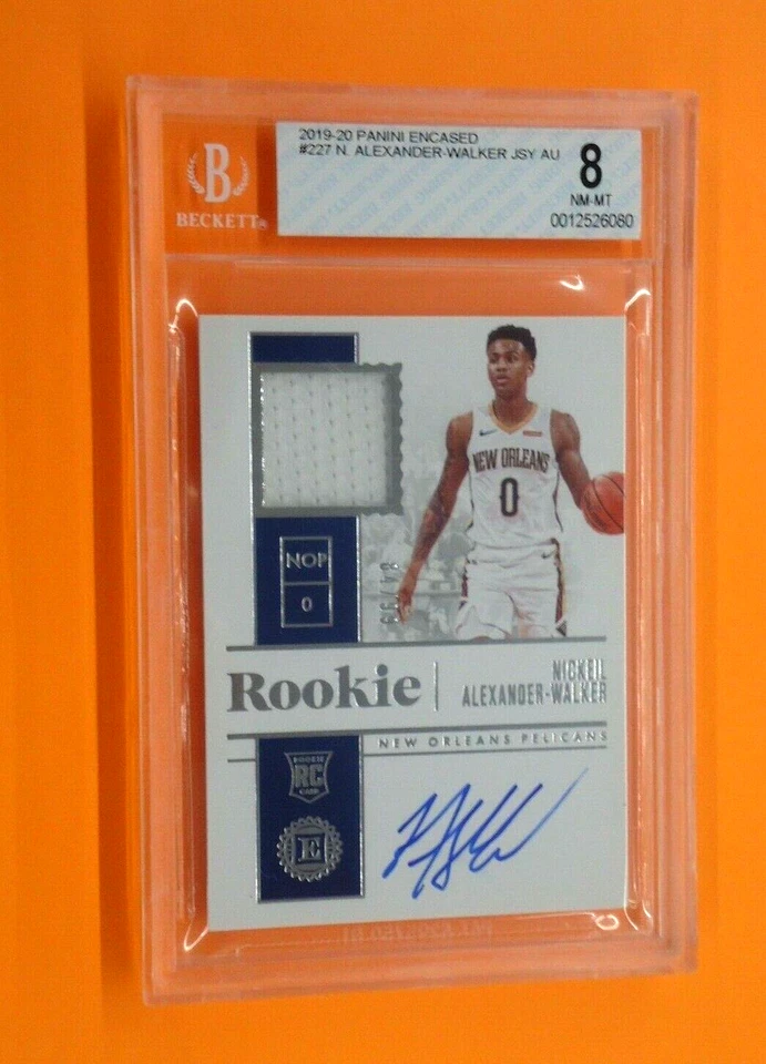 Nickeil Alexander-Walker 2019-20 ENCASED ROOKIE MEM/AUTO 84/99 Card #227 GRADE 8 - Image 1 of 3