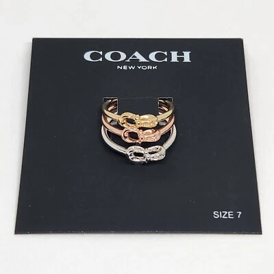 Juego de 3 anillos apilables COACH talla 7 firma oro pavé, oro rosa, plata nuevo con etiquetas Foto 1 de 4