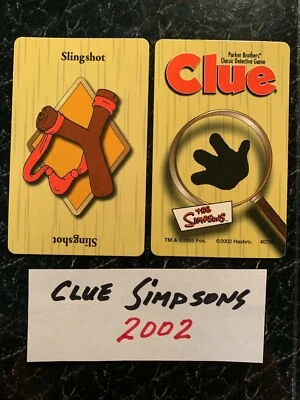 Clue Simpsons SLINGSHOT  WEAPON CARD Game Replacement Piece 2002 - Image 1 of 3