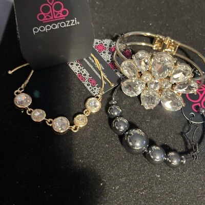 3 pulseiras paparazzi novas em folha prata e tom dourado pedras grandes transparentes - Imagem 1 de 4