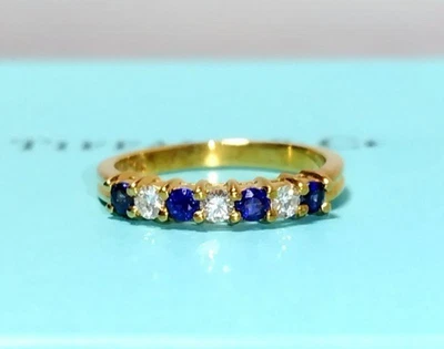 Anillo Tiffany & Co Vintage 4 Zafiros y 3 Diamantes Oro Amarillo 18k Banda con Estuche Foto 1 de 4