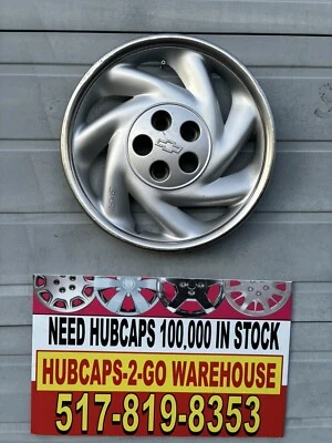 "Chevrolet Cavalier Beretta 1992-99 tapacubos 1 original atornillado, usado". Erupción en bordillo Foto 1 de 4