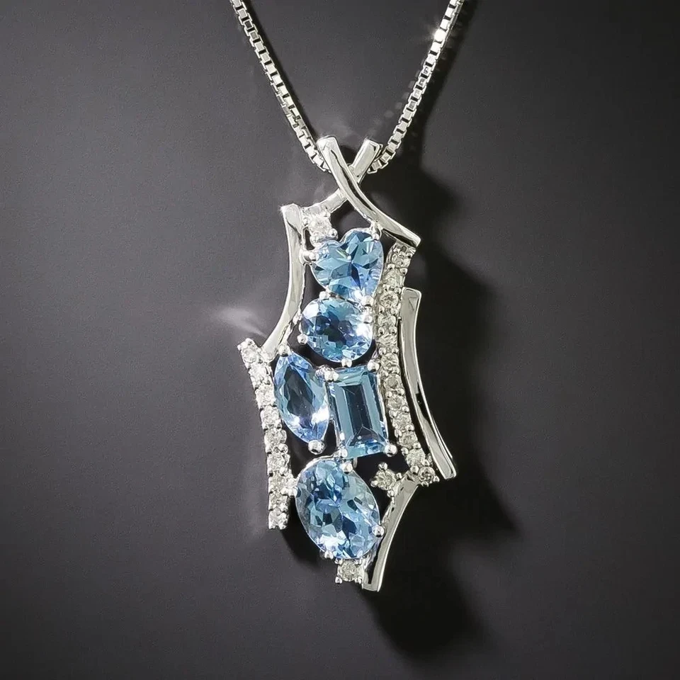Colgante con racimo de aguamarina creado en laboratorio de corte múltiple de 2 quilates enchapado en oro blanco de 14 en plata Foto 1 de 4