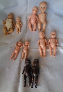 LOTTO 10 BAMBOLE CELLULOIDE NERE VINTAGE DOLL POUPEE DIVISA RARA DIVERSI MARCHI - Foto 1 di 15
