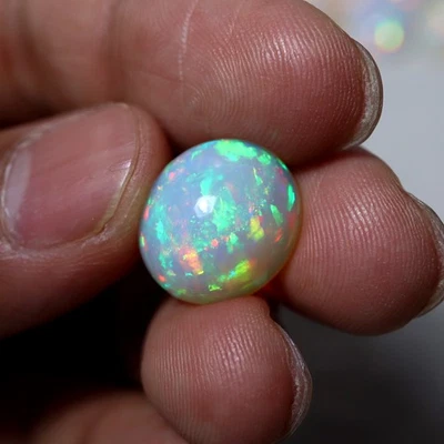 8.4 Cts Natural AAA Flashy Rainbow Fire Ethiopian Opal 15.6x13.8MM Oval Cabochon - Image 1 of 4