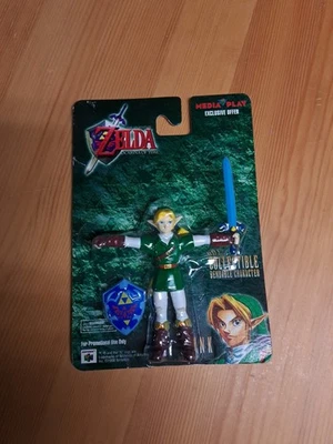 Boneco promocional Legend Of Zelda N64 Link 1998 Media Play exclusivo dobrável. - Imagem 1 de 3
