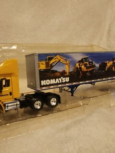1ST GEAR KOMATSU INTERNATIONAL 8600 W/53' TRAILER TRUCK NIB 1/64 SCALE NEW - Picture 1 of 4