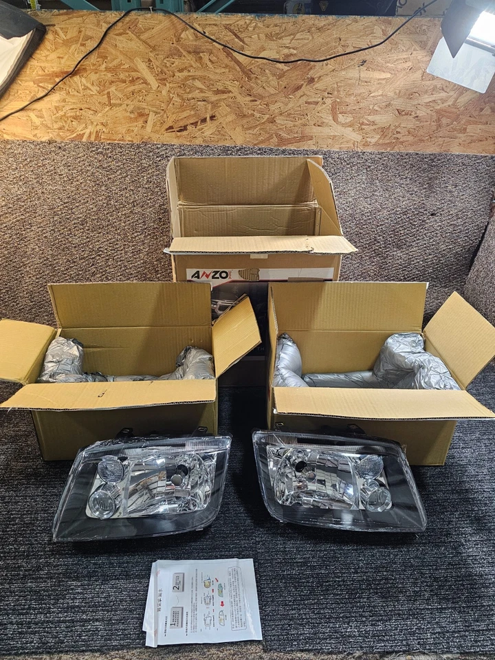 (CANTIDAD 2) Conjunto de faros europeos negros Anzo 121169 para Volkswagen Jetta 1999-2005 Foto 1 de 4