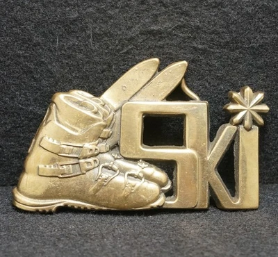 WG09169 VINTAGE 1980 **ESQUI** BOTAS LATÃO SÓLIDO PROPAGANDA CINTO FIVELA - Imagem 1 de 2