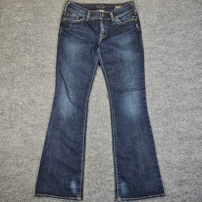 Pantalones de mezclilla plateados Suki Bootcut para mujer talla 31 lavado oscuro tiro medio azul elástico Foto 1 de 4