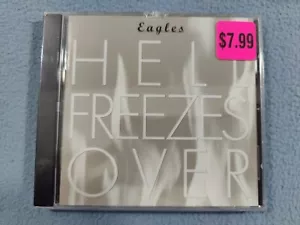 NEU SEALED EAGLES - HELL FREEZES OVER CD - Bild 1 von 3
