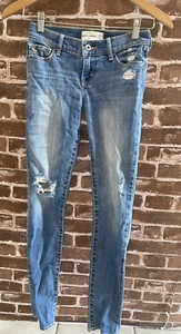 ABERCROMBIE KIDS GIRLS 14 SLIM DISTRESSED JEANS BLUE HOLES GUC - Picture 1 of 6