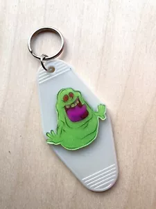 Slimer Ghostbusters Keyring Glow In The Dark Hotel Motel Fob Key Chain Gift - Foto 1 di 5
