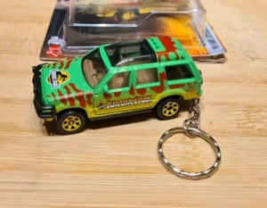 1/64 Diecast Modellauto Schlüsselanhänger Keyring 1993 '93 Ford Explorer Jurassic World  - Bild 1 von 5