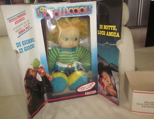 I FOTOLUCCIOLI BAMBOLA PUCCI FIBA FOSFORESCENTE COD.2532-25 CM 10" PELUCHE RARA - Imagen 1 de 11