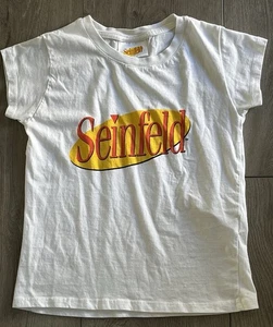 Camiseta Unisex Seinfeld Años 90 Comedia Programa de TV El Mini Calce Manga Corta Talla XS - Imagen 1 de 8