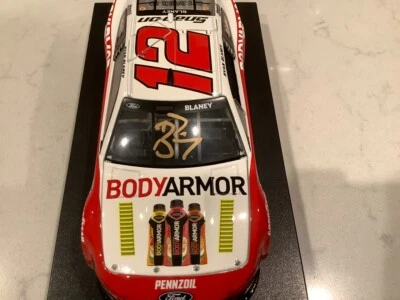 RYAN BLANEY AUTOGRAPHED 2022 FORD MUSTANG BODY ARMOR DIECAST & CARD - Image 1 of 4