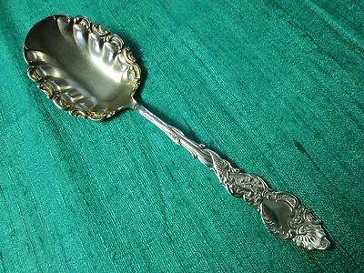 Cuchara para servir Columbia plateada 1893 estilizada delfín cuenco dorado sin monograma Foto 1 de 4