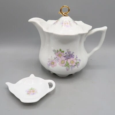 Tetera de cerámica blanca floral tono dorado superior rosa púrpura flor con reposacuchara Foto 1 de 4