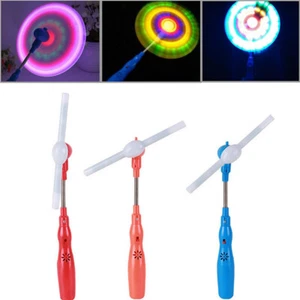 Flashing Light Up LED Spinning Windmill Glows Child Toy Music Present Gif.l8 - Photo 1/9