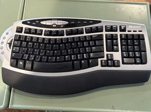 Microsoft Wireless Comfort Keyboard 4000 Model 1045 Ergonomic - Picture 1 of 5