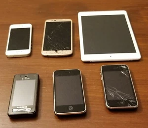 Three iPhones. One LG phone. One Samsung phone. One NuVision Tablet. Parts only. - Picture 1 of 6