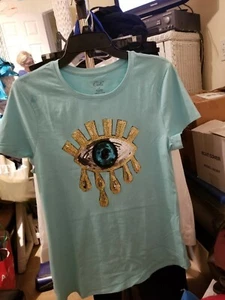 Damen Teens T-Shirt Pastellgrün Größe M / L Augen Pailletten Design Patch. - Bild 1 von 3