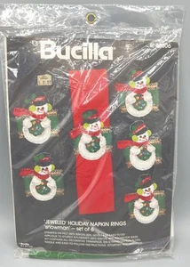 Vintage Bucilla Filz Urlaub Weihnachten Serviettenringe Pailletten Schneemann 48806 versiegelt - Bild 1 von 2