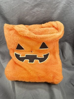 Bolsa de tela de caramelo de Halloween calabaza naranja difusa Foto 1 de 4
