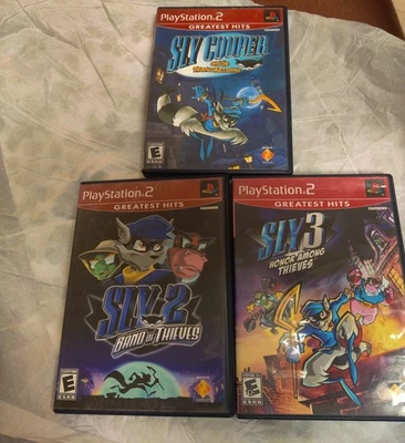 Lot Of 3  Sly Cooper-Sly 2-Sly 3 PS2 Games All Tested & Work!! - Image 1 of 3