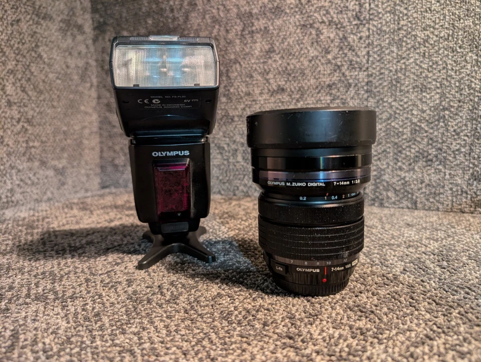 Olympus M.Zuiko Digital Ed 7-14mm f/2.8 Pro Lens with Box And Flash - Image 1 of 4