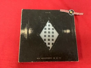 R.E.M. New Adventures in the Hi-Fi Special Book Rock CD USED Piranha Records - Imagen 1 de 4